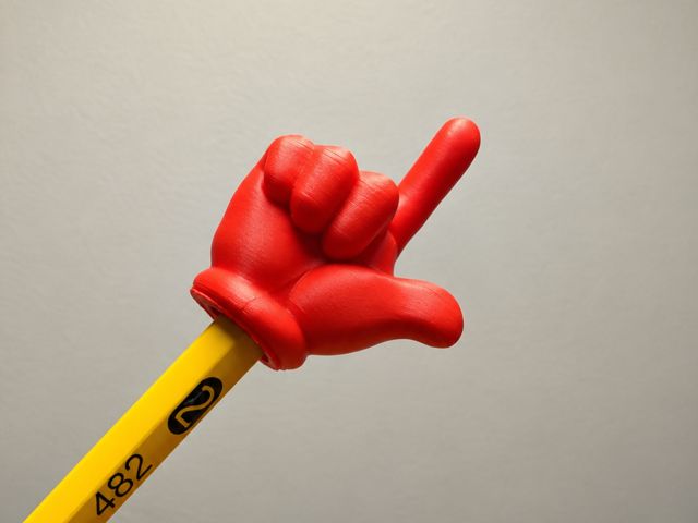 Pointing hand (pencil/pen)